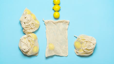 Lemons-in-eco-bags,-animation.-Eco-friendly-packaging-with-fabric-mesh-bags